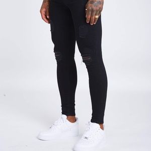 Jet Black Jeans - Ripped. Size 32 regular.